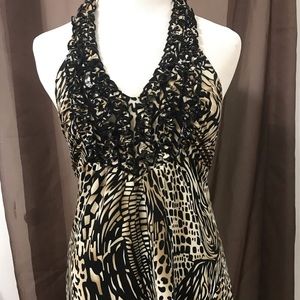 Mixed leopard print pattern dress top.